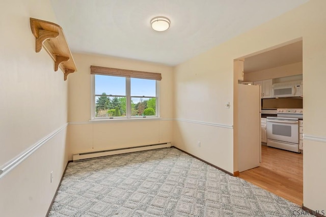 527 Patton St, Somerset, PA 15501 - unfurnished room with a baseboard radiator and light wood-type flooring