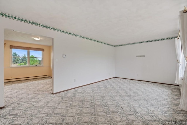 527 Patton St, Somerset, PA 15501 - spare room with baseboard heating, carpet, and baseboards