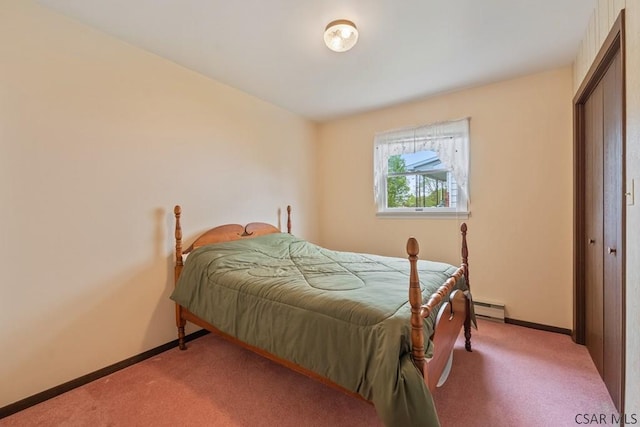527 Patton St, Somerset, PA 15501 - bedroom with light colored carpet, baseboard heating, baseboards, and a closet