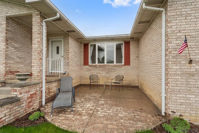 527 Patton St, Somerset, PA 15501 - view of side of home featuring brick siding and a patio area