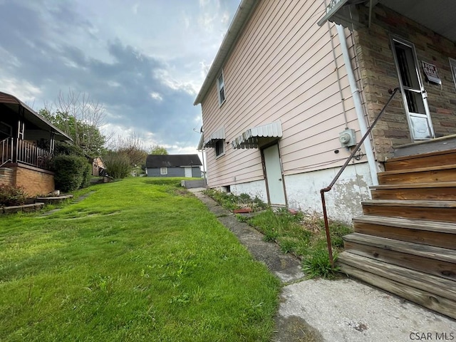 115 N St, Johnstown, PA 15906 - view of property exterior featuring a lawn