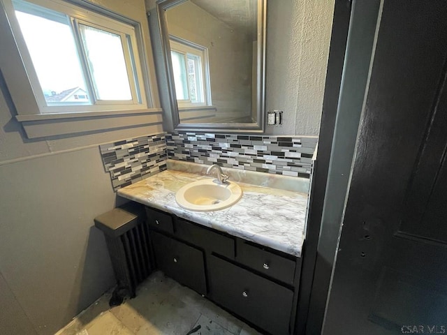 115 N St, Johnstown, PA 15906 - bathroom featuring backsplash and vanity