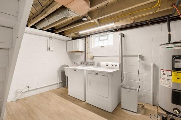 1082 W Main St, Somerset, PA 15501 - washroom with water heater, separate washer and dryer, and light wood-type flooring