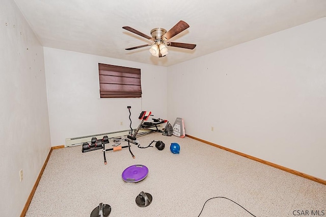 workout area with a baseboard radiator, baseboards, a ceiling fan, and carpet flooring