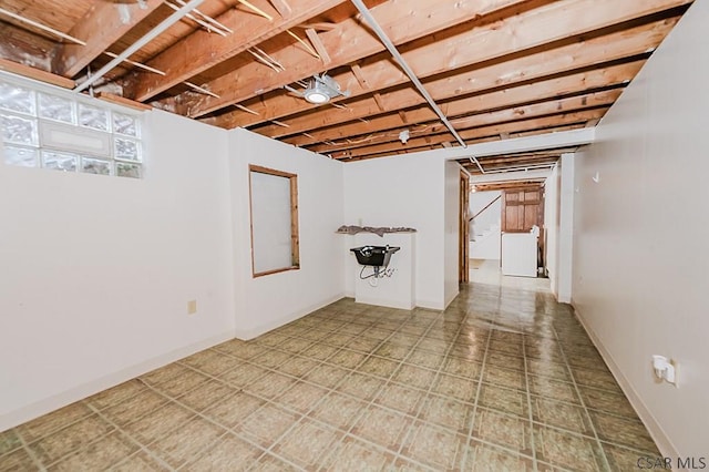 basement with washer / clothes dryer