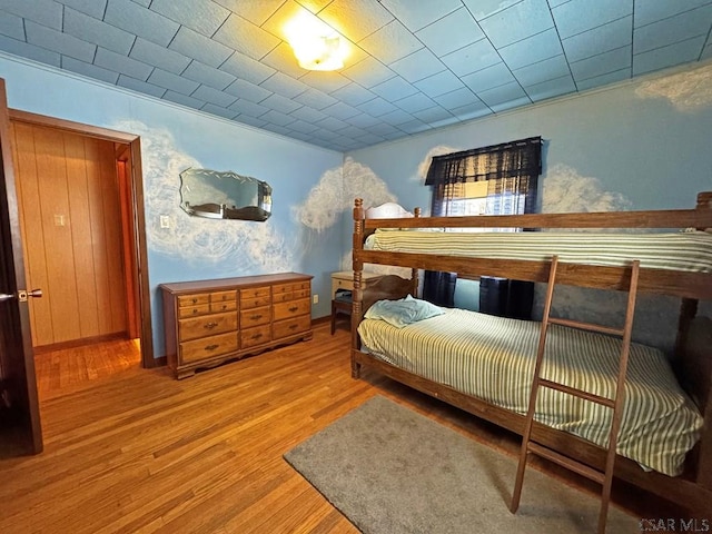 bedroom with hardwood / wood-style flooring