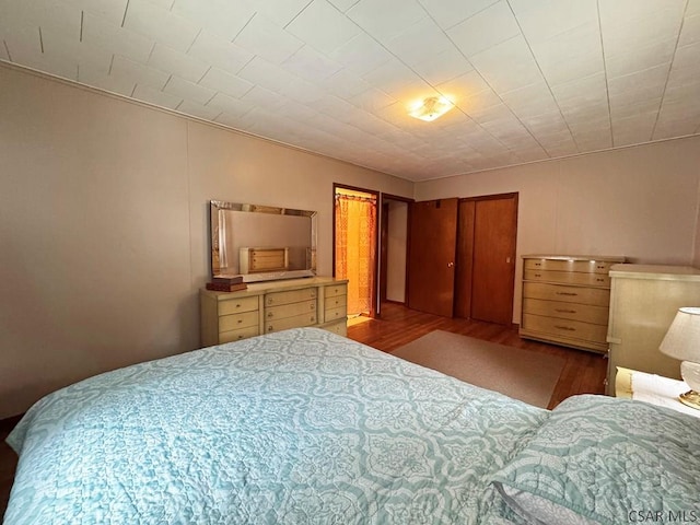 bedroom with light hardwood / wood-style floors