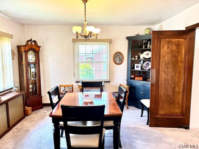 1727 Ringling Ave, Johnstown, PA 15902 - dining room featuring light colored carpet and a chandelier