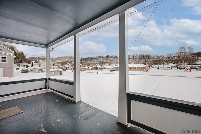 view of unfurnished sunroom