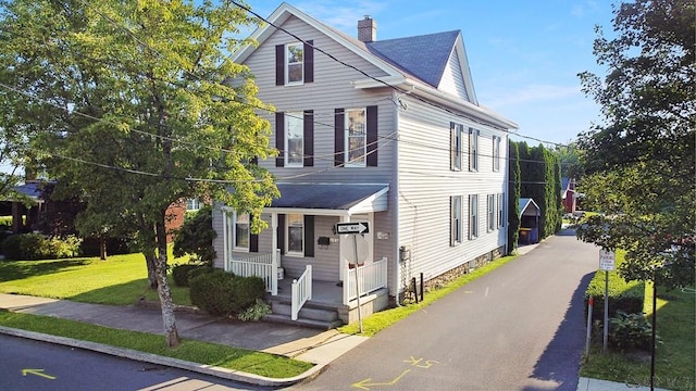 view of front of home with a front yard