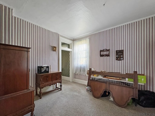 interior space featuring light carpet and ornamental molding