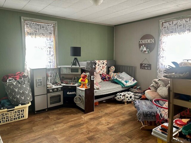 bedroom featuring hardwood / wood-style flooring