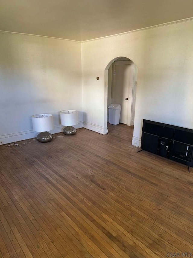 spare room with dark wood-type flooring