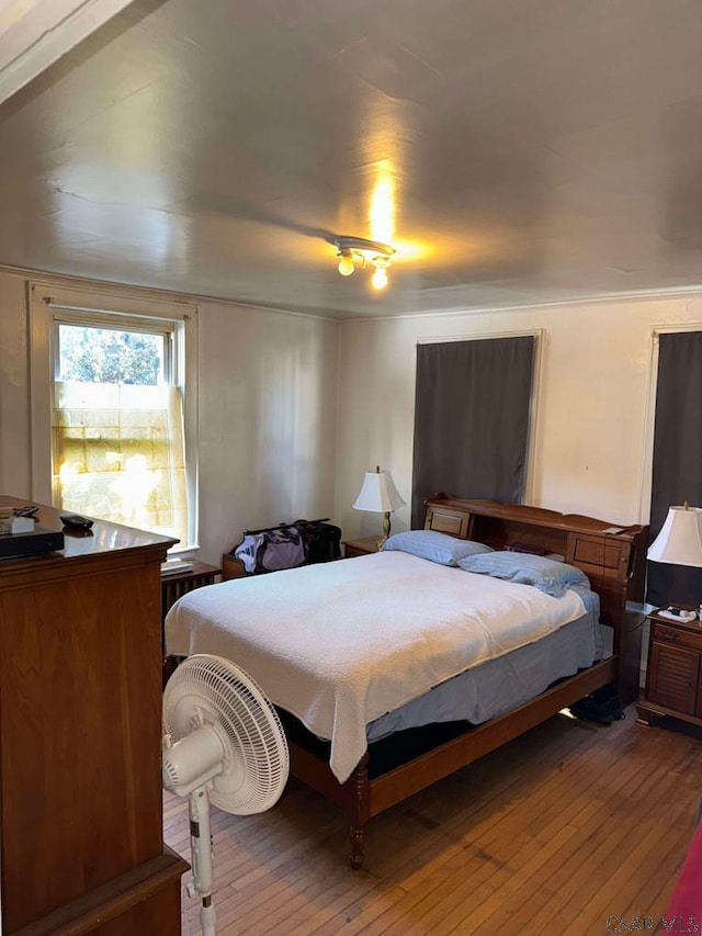 bedroom featuring hardwood / wood-style floors