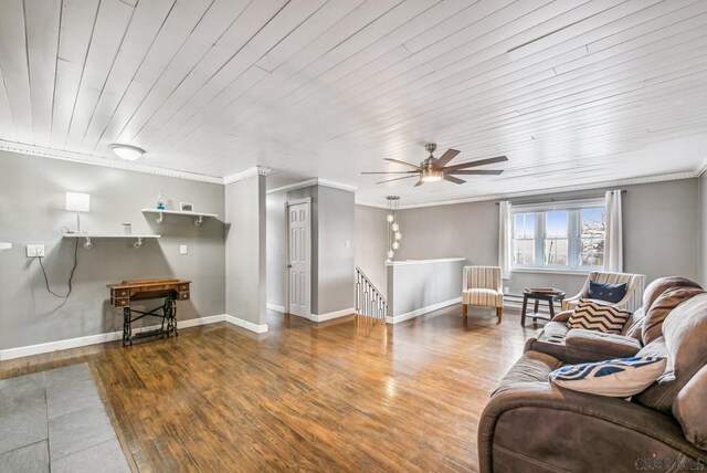 living room featuring wood ceiling, ceiling fan, ornamental molding, and hardwood / wood-style flooring