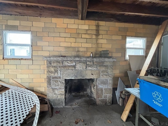 room details featuring a stone fireplace