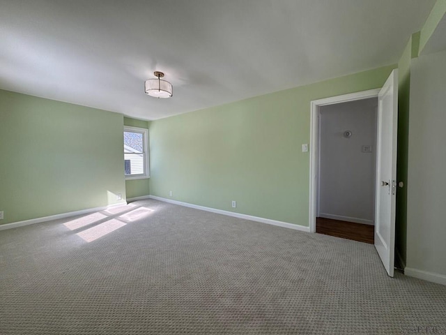 empty room with carpet flooring