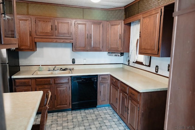 kitchen featuring sink, ornamental molding, and dishwasher