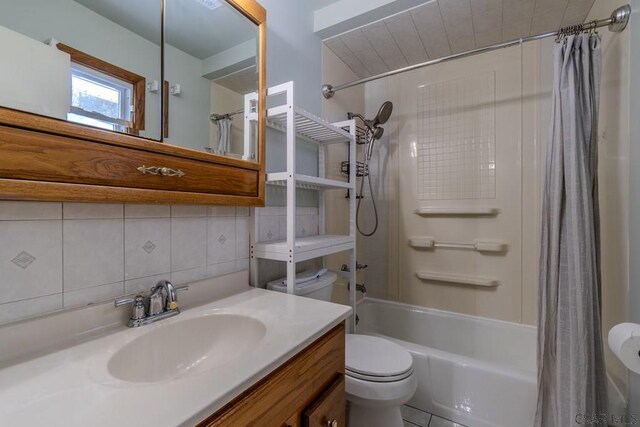 full bathroom with tasteful backsplash, vanity, shower / bath combination with curtain, and toilet