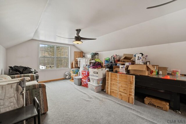 additional living space featuring ceiling fan, lofted ceiling, and carpet