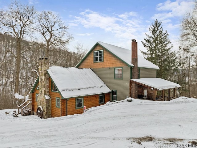 view of snow covered property