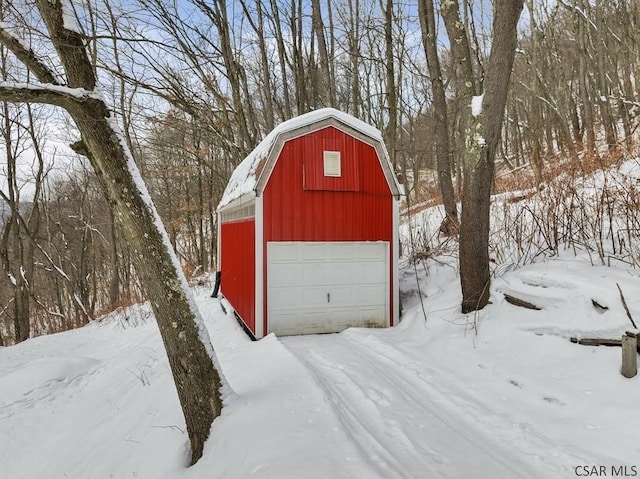 view of snow covered garage