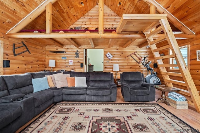 living room with lofted ceiling, wooden ceiling, wood-type flooring, and rustic walls