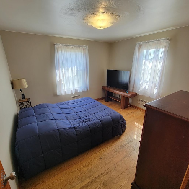 bedroom featuring light hardwood / wood-style flooring