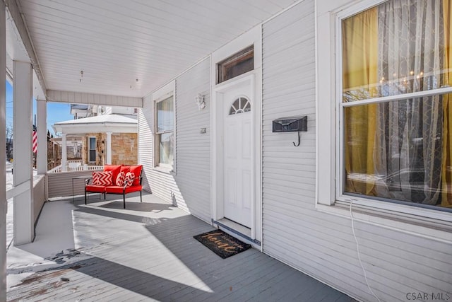 entrance to property with a porch