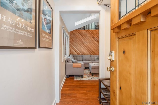 interior space with dark wood-style floors and baseboards