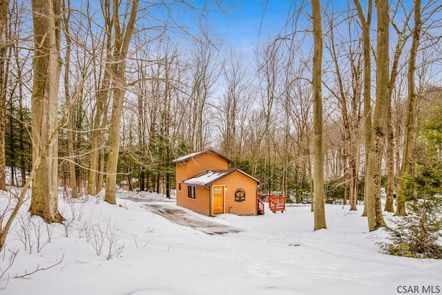 view of yard covered in snow