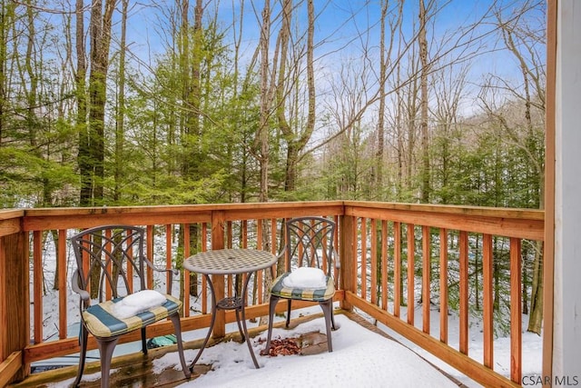 view of snow covered deck