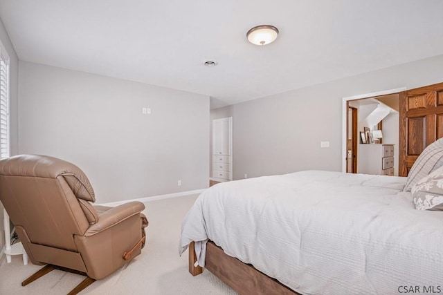 bedroom with carpet flooring, visible vents, and baseboards