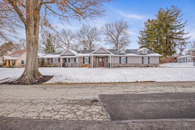 view of front of home featuring stone siding