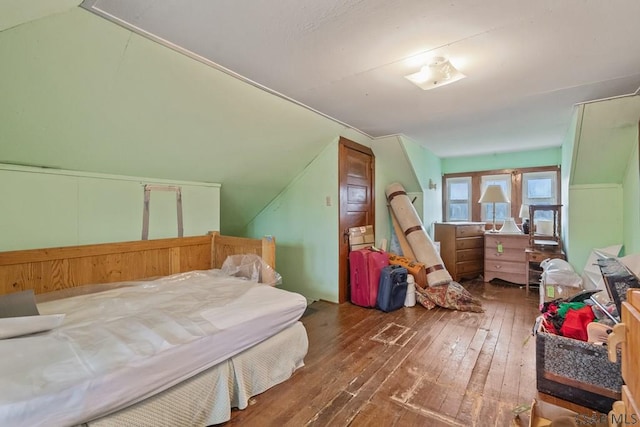 624 Oden St, Confluence, PA 15424 - bedroom with wood-type flooring and lofted ceiling