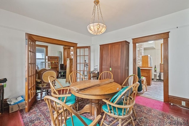 624 Oden St, Confluence, PA 15424 - dining space featuring french doors and dark wood-style floors