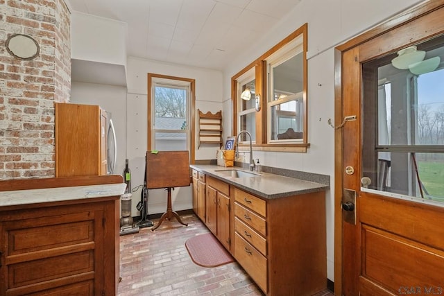 624 Oden St, Confluence, PA 15424 - bathroom featuring brick floor and vanity