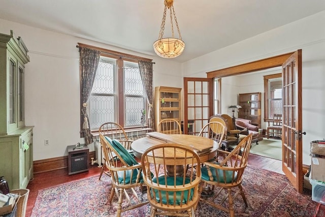 624 Oden St, Confluence, PA 15424 - dining space featuring baseboards, french doors, and wood finished floors