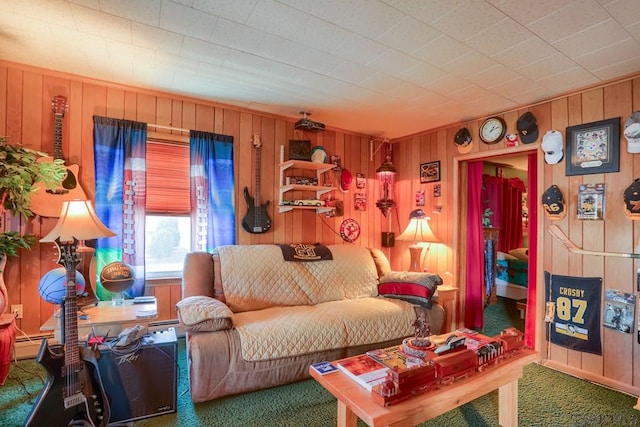 living room with a baseboard heating unit, wooden walls, and carpet