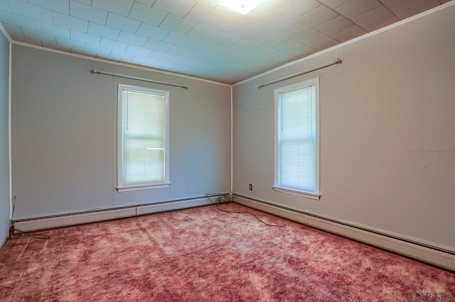 unfurnished room with crown molding, carpet flooring, and baseboard heating