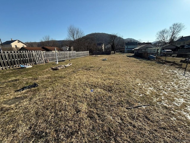 view of yard with fence