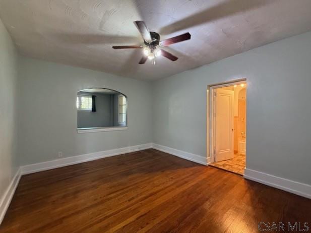 106 Lucetta St, Johnstown, PA 15905 - unfurnished room featuring wood finished floors, ceiling fan, and baseboards