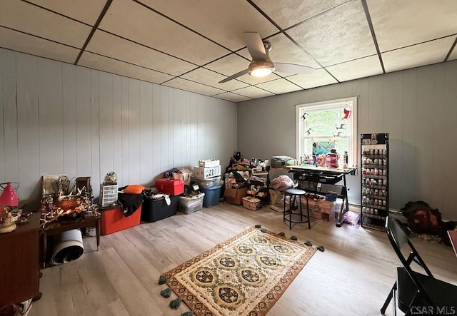 304 Oak St, Conemaugh, PA 15909 - dining space featuring wood finished floors, ceiling fan, a paneled ceiling, and wood walls