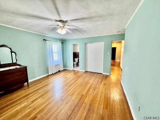 1502 Goucher St, Johnstown, PA 15905 - unfurnished bedroom with ornamental molding, light wood-style floors, baseboards, ensuite bathroom, and ceiling fan