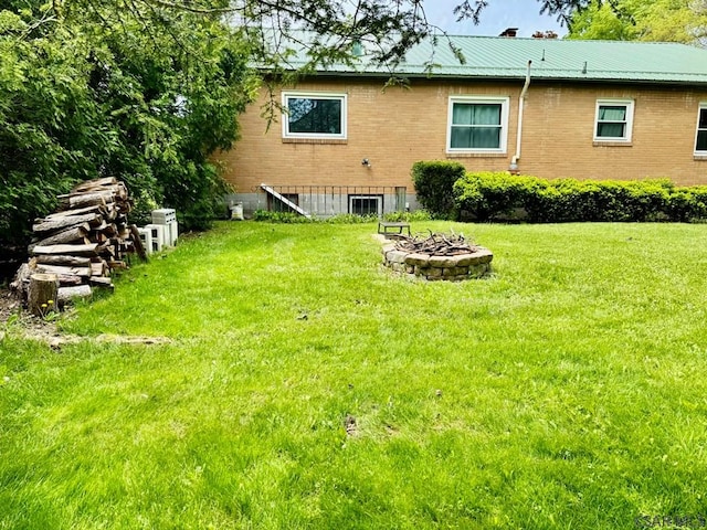 1502 Goucher St, Johnstown, PA 15905 - view of green lawn featuring a fire pit