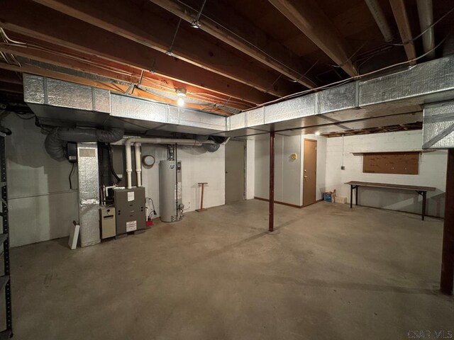 basement with heating unit and gas water heater