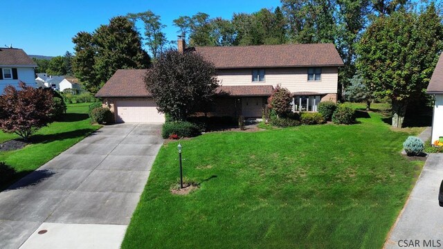 view of front of house with a front lawn