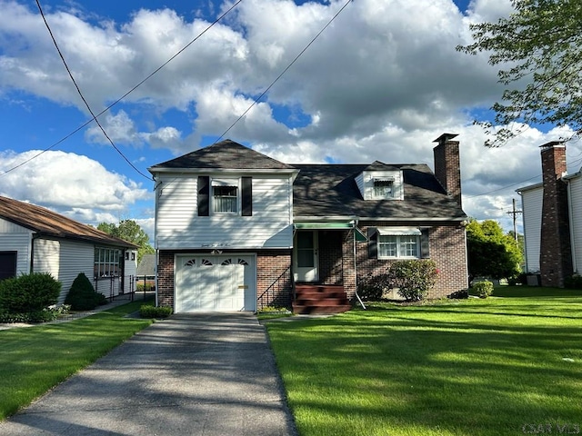 2269 Sunshine Ave, Johnstown, PA 15905 - view of front of home with brick siding, a front lawn, driveway, a garage, and a chimney