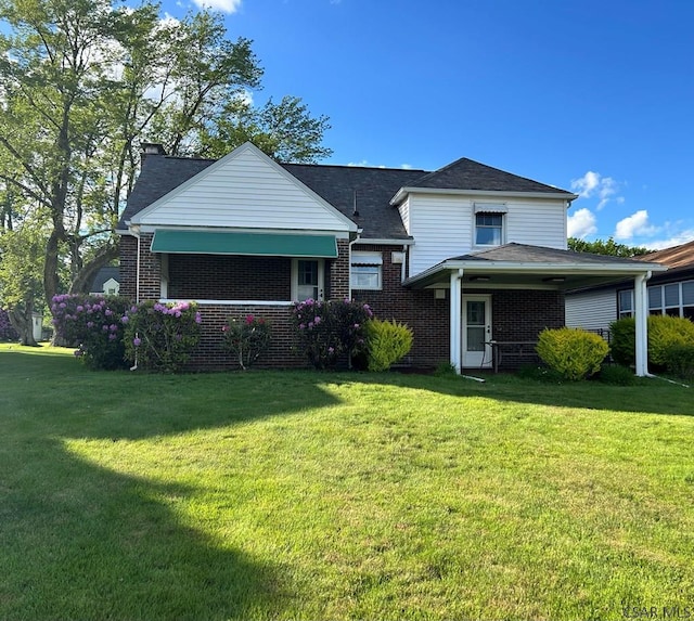 2269 Sunshine Ave, Johnstown, PA 15905 - view of front of property featuring a front yard and brick siding