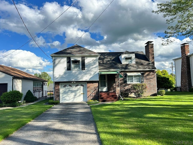 2269 Sunshine Ave, Johnstown, PA 15905 - view of front of property featuring brick siding, driveway, a front yard, and a garage